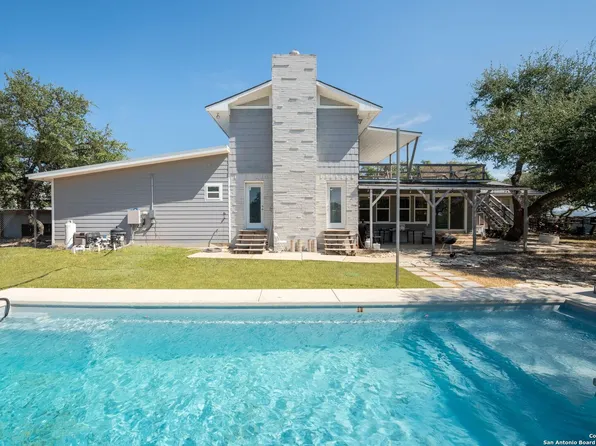 Anti-glare window tint installation at a New Braunfels TX backyard pool